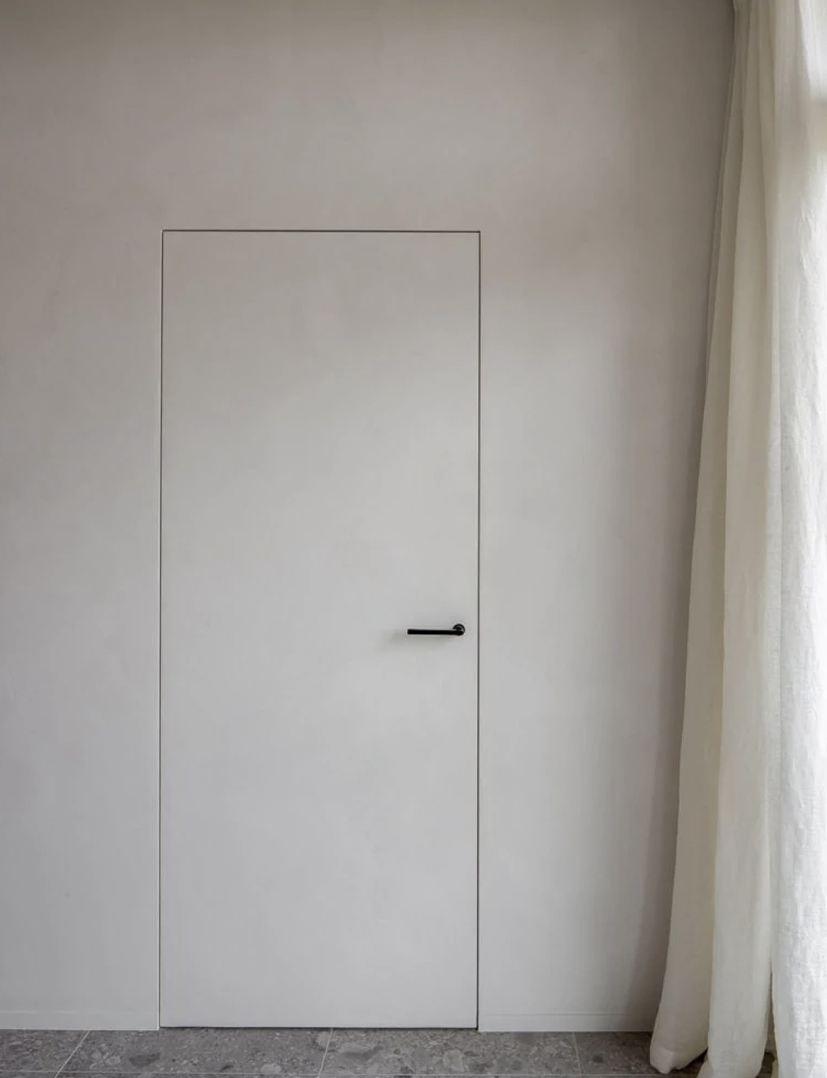 porte invisible intégrée au mur